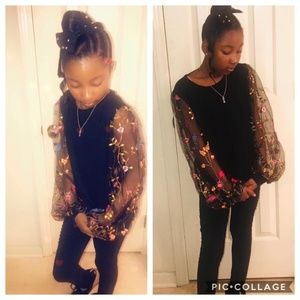 Black T with floral shear arms